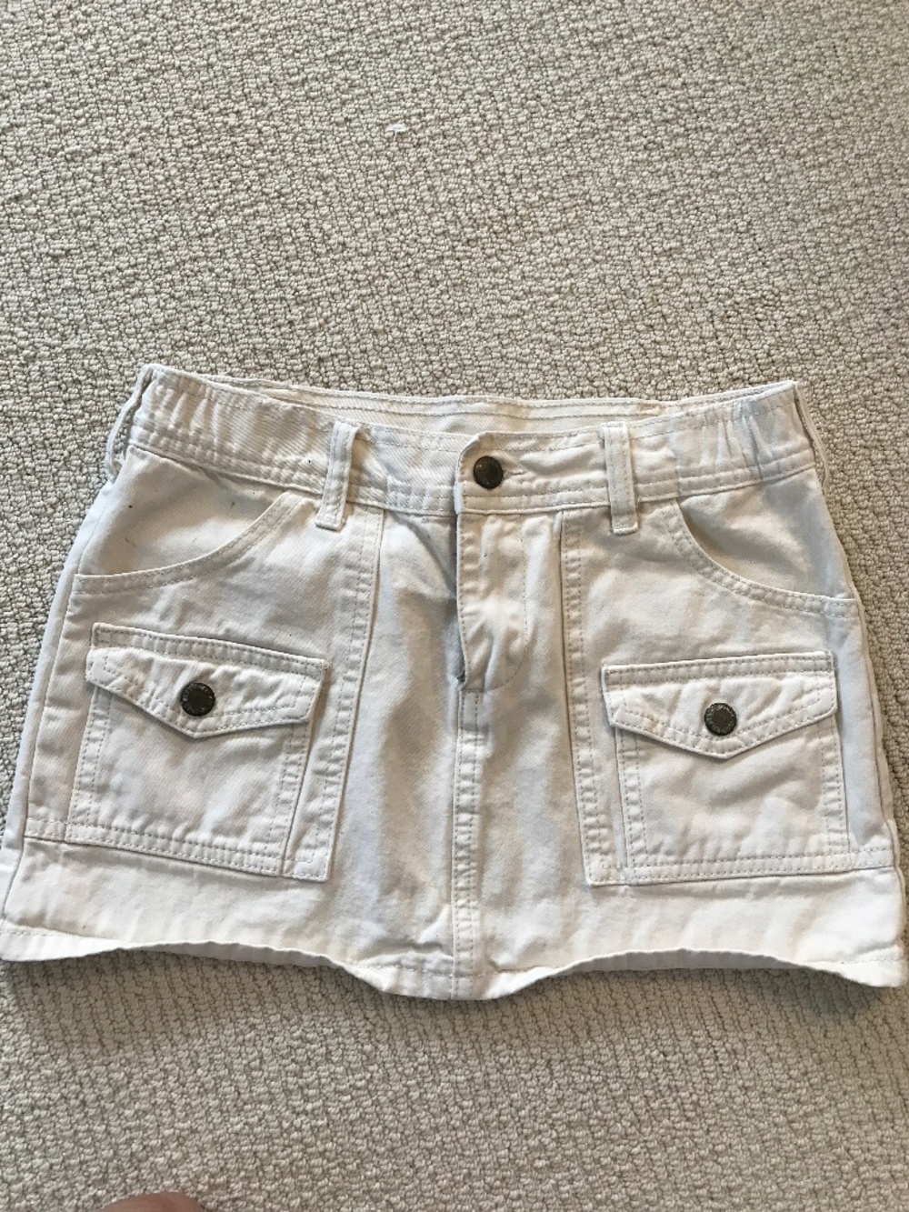 Brandy Melville cream colored cargo style mini skirt